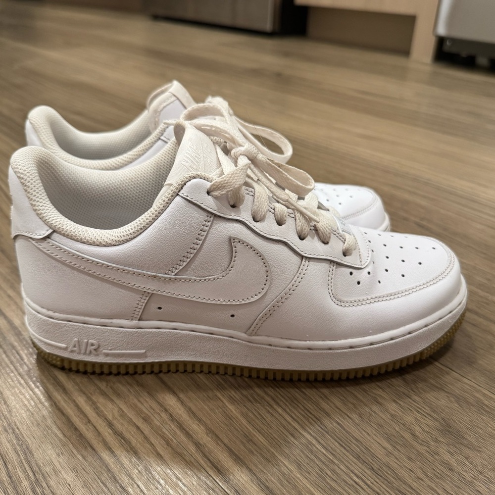 Nike Air Force White Sneakers
Gum Bottoms